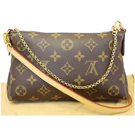 pouch clutch louis vuitton|louis vuitton clutch monogram.